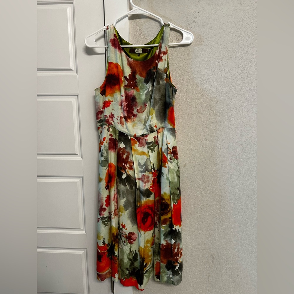 Beautiful silk lined anthro midi dress. Size 10.